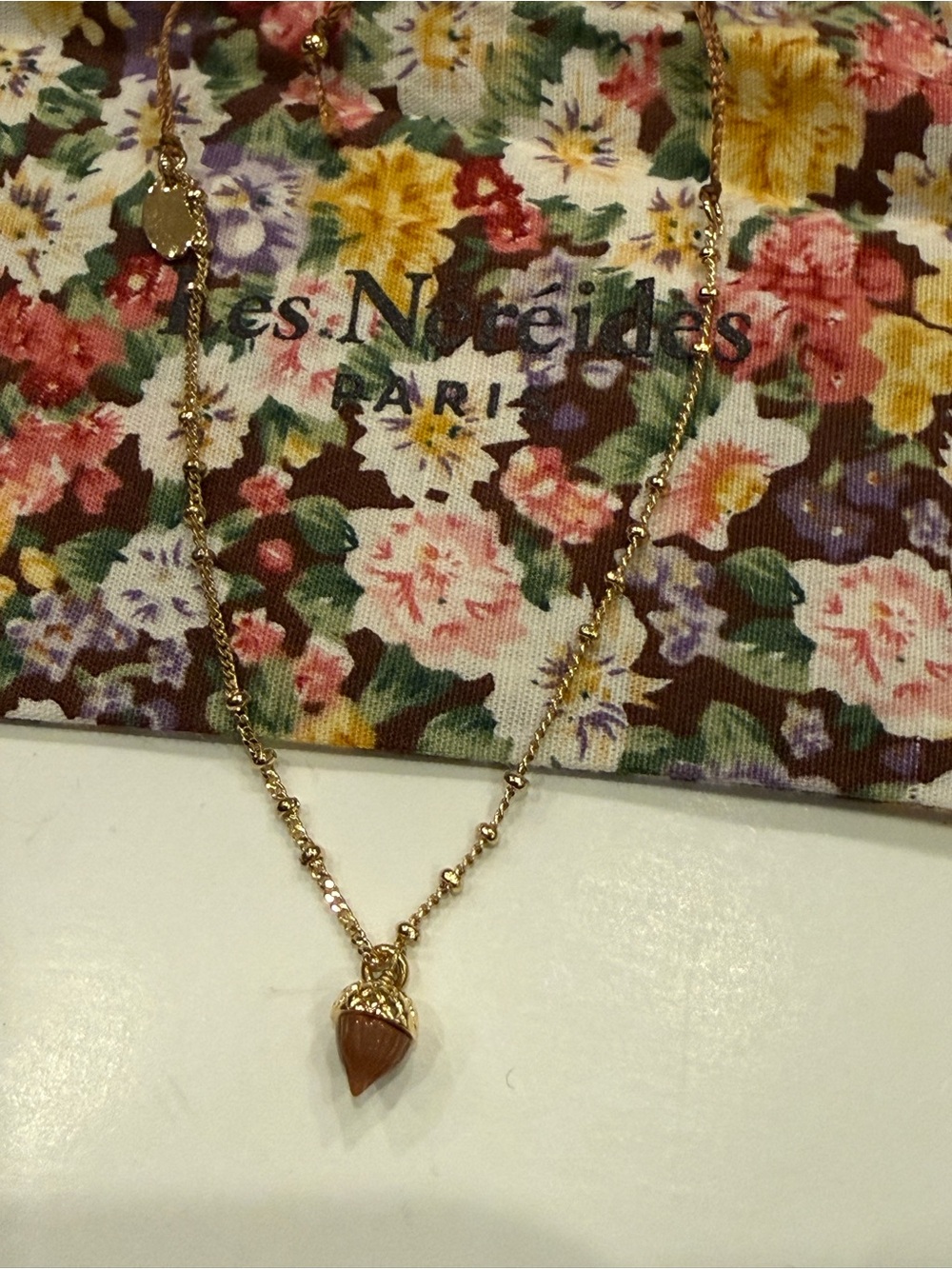 Les Néréides Gold-Tone Acorn Charm Bracelet in Brown